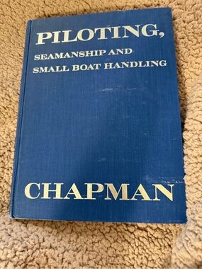 Piloting seamanship & small boat handling hardcover book writing on front page